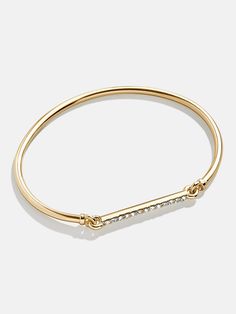 Everyone needs a classic cuff in their jewelry box. Our Holly Cuff is a gold wrist layer accented with pavé stones on the clasp that give this piece a utility-inspired look. We recommend pairing this style with a few of our best-selling Pisa bracelets. Bauble Bar Jewelry, Bauble Bar, Stone Jewellery, Bar Jewelry, Gold Bracelet Cuff, Gold Cuffs, Jewelry Inspo, Gem Stone, Bracelet Stack