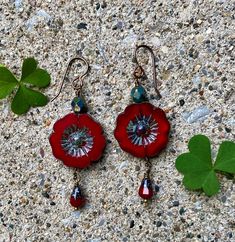 These earrings will definitely be eye catching. Perfect for any occasion, the rich red in the Hibiscus Flower will compliment many outfits. Crafted with a beautiful 22mm Czech table cut hibiscus flower bead accented with a 6mm Turquoise Picasso bead, red drop bead and antique brass wire. Delivered in a cute hand made origami box Red Hibiscus Flower, Red Hibiscus, Earrings Ideas, Origami Box, Dragonfly Necklace, Handmade Earrings Beaded, Earring Ideas, Earrings Beaded, Hibiscus Flower