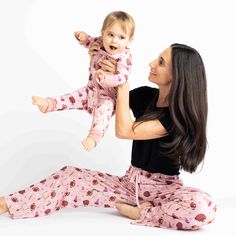 The softest viscose bamboo relaxed fit pants in our rose Game Day football print. Adults can now experience the comfort of bamboo for themselves with our relaxed fit lounge pants designed for sleep and everyday wear! Pair these with our comfortable tees + match your little ones with our cutest in-house designed patterns. This fun fall print is perfect for the whole family! Don't miss the green version as well. COMFORT: Made from high quality bamboo, our pajamas are the recipe for comfort. Our st Relaxed Fit Pants With Elastic Waistband For Bedtime, Comfortable Pink Long Pants Sleepwear, Comfortable Pink Pants For Loungewear, Comfortable Pink Loungewear Pants, Comfortable Pink Lounging Pants, Comfortable Relaxed Fit Pants For Bedtime, Comfortable Relaxed Fit Bedtime Pants, Pink Relaxed Fit Bottoms For Lounging, Pink Relaxed Fit Bottoms For Relaxation