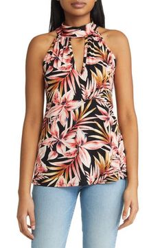 Amp up your day-to-night look in a jersey mock-neck halter top featuring an alluring cutout and a pretty palm print. 25" length Mock neck Sleeveless, with cutaway shoulders 95% rayon, 5% spandex Machine wash, dry flat Imported Floral Print Stretch Tops For Vacation, Vacation Floral Print Halter Neck Top, Black Tropical Tops For Spring, Tropical Black Tops For Spring, Spring Tropical Black Top, Tropical Print Sleeveless Halter Top, Versatile Stretch Halter Top For Vacation, Stretch Printed Tops For Night Out, Summer Floral Print Halter Neck Top