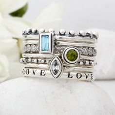 We designed each band in wax by hand and then cast them in silver ~ and we are in love with how well they mix and match!  You can design a ring using any combination you want!  Mix any number of bands and birthstone rings to create a ring unique to you. You can design the perfect ring just for you or it makes the perfect gift for your friend, sister or mom! Also available in gold vermeil:  https://www.etsy.com/listing/728172200 ♥♥ HOW TO ORDER ♥♥ **If item is ordered correctly and we have no que Ring Sets Silver, Silver Stackable Rings, Stackable Birthstone Rings, Rings Stacking, Silver Bands, Stackable Rings Silver, Birthstone Rings, Rings Handmade, Unique Bands