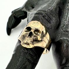 A Inspired by ancient artifacts of a bygone age. Oxidized and then sanded to reveal the golden bronze color, while leaving the oxidation in some areas to create contrast. Crafted with meticulous attention to detail. Cast in solid bronze. Size: 10 Dark Modern, Ancient Artifacts, Skull Ring, Guinea Bissau, Equatorial Guinea, Bronze Color, Modern Jewelry, Ethiopia, Artifacts