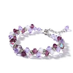 A dazzling twist on a classic style, this sparkling bracelet complements any attire. This design shimmers with fancy purple crystals and glittering white crystals. An anytime look of wonder, this shimmering bracelet is an on-trend style story.Weight: 11.1 gMaterial: Stainless SteelBracelet Size: 205 mmStone Type: Jeulia® StonePlating Color: Silver Purple Crystal Bracelet, Sparkle Bracelet, White Crystals, Trend Style, Bracelet Online, Halloween Sale, Purple Crystals, Crystal Bracelet, Bracelet For Women