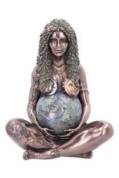 a statue of a woman sitting in the middle of a yoga pose holding a globe