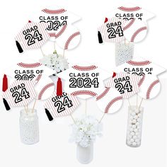 baseball themed graduation decorations in vases with stickers and flowers on them for the class of 2021