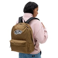 The Vans Realm Backpack is a two pocket backpack with debossed lining at the interior back panel. It has a zippered main compartment, a front organization pocket for storing items neatly and an interior laptop sleeve. It measures 42,5 H x 32,4 W x 12 D cm and has a 22-litre capacity. It has the Vans Off The Wall branding on the front. LAPTOP SLEEVE - Keep your laptop safe in a padded internal laptop sleeve. Fits most full-sized laptops. ORGANISATION - Arrange your cords, pens, and other importan Vans Bags For Students Back To School, Vans Travel Backpack, Vans Bags For Back To School, Vans Backpack For School, Vans Backpack For Everyday Use, Vans Backpack For Back To School, Vans Standard Backpack For Travel, Vans Backpack For Travel And Back To School, Vans Backpack For Everyday And Back To School