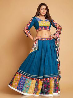 The Desi Diva Chaniya Choli is a beautiful outfit that is perfect for traditional Indian Festival Wear.  Fabric: Cotton Silk Work: Sequin and Mirror Work Product Type: Ready to Wear Size Blouse Size Medium (38) Desi Diva Fashion Blue Bohemian Lehenga With Traditional Drape, Fitted Blue Bohemian Lehenga, Bohemian Long Sleeve Lehenga With Pallu, Bohemian Long Sleeve Choli For Transitional Season, Fitted Bohemian Sets With Multicolor Embroidery, Bohemian Semi-stitched Blue Lehenga, Blue Semi-stitched Bohemian Sets, Bohemian Blue Semi-stitched Lehenga, Bohemian Blue Traditional Wear For Navratri