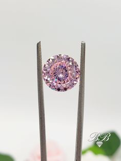 This listing is for a 5A quality pink Portuguese cut cubic zirconia loose stone in the size of your choosing. Gem Type: Lab Created Cubic Zirconia Diamond Shape: Round Portuguese Cut Size: Your Choice Color: Pink Quality: 5A Hardness: 8.5 Mohs Available Sizes 8mm (2 carats approximately) 9mm (3 carats approximately) 11mm (5 carats approximately) 13mm (8.5 carats approximately) Example in ring - www.etsy.com/listing/1205188133 Did you know there are different grades of cubic zirconia? (A - 6A) The higher the grade, the better the material, polish and more accurate the cut. Most cubic zirconia jewelry is made with grade 3A cubic zirconias. 3A (AAA) is a good and popular quality because of it's relatively cheap price. 3A stones are cut and polished faster so less care is taken during producti Dazzling Brilliant Cut Cubic Zirconia Gemstones, Pink Diamond Gemstones For Gift, Cubic Zirconia Gemstones With Prong Setting, Vvs Clarity Round Cut Cubic Zirconia Gemstone, Pink Round Gemstones With Prong Setting, Round Cubic Zirconia Gemstones With Prong Setting, Pink Moissanite Jewelry With Prong Setting, Pink Gemstones With Prong Setting For Anniversary, Dazzling Round Cubic Zirconia Gemstones