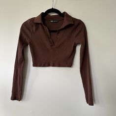 Super Cute Cropped Longsleeve In A Rich Dark Brown Color. Never Worn. Brown Stretch Long Sleeve Top, Stretch Brown Long Sleeve Tops, Fitted Long Sleeve Ribbed Top, Long Sleeve Ribbed Cotton Crop Top, Chic Ribbed Long Sleeve Tops, Chic Long Sleeve Ribbed Top, Ribbed Long Sleeve Crop Top For Fall, Solid Color Cropped Long Sleeve Top For Fall, Zara Long Sleeve Tops For Fall