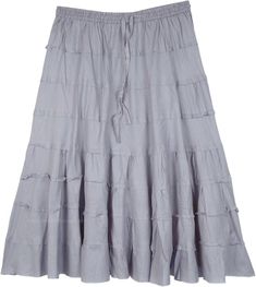 A beautiful cotton skirt with full tiers with an uneven hem in steel gray; an ideal skirt for summer season.  The skirt is fully tiered and the wide hemline gives it a nice fall. #tlb #JuniorPetite #TieredSkirt #vacationclothing #beachwrap #Solid #shortskirt #tieredskirt #graycottonskirt Tiered Cotton Skirt With Layered Hem, Gray Tiered Summer Skirt, Gray Tiered Skirt Bottoms For Spring, Gray Tiered Skirt For Summer, Gray Tiered Skirt For Spring, Summer Tiered Gray Skirt, Spring Gray Tiered Skirt, Casual Gray Tiered Skirt, Gray Cotton Skirt For Spring