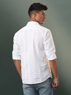 SHVAAS BY VASTRAMAY Men's White Chikankari Cotton Shirt Embrace timeless style with this Shvaas by Vastramay men's shirt. Features intricate chikankari embroidery on white cotton for a sophisticated look. Perfect for casual wear or special occasions. Features: White cotton with chikankari embroidery Shirt collar Button closure Full sleeves Specifications: Fit: Relaxed (refer to size chart for details) Hem: Straight Material & Care: Material: Cotton Care: Dry clean only Legal Disclaimer: The prod Traditional Cotton Shirt With Intricate Embroidery, Long Sleeve Cotton Shirt With Chikankari Embroidery, Traditional White Shirt With Chikankari Embroidery, Cotton Long Sleeve Shirt With Intricate Embroidery, Fitted Cotton Shirt With Resham Embroidery, Long Sleeve Cotton Shirt With Intricate Embroidery, Festive White Cotton Shirt, White Cotton Shirt With Chikankari Embroidery, Traditional Cotton Shirt With Chikankari Embroidery