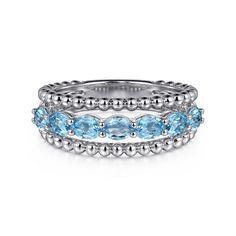 This sterling silver ring features a Swiss blue topaz gemstone with a total carat weight of 1.34. Part of the Gabriel & Co collection. Blue Topaz Gemstone, Silver Anklets, Natural Diamond Engagement Ring, Swiss Blue Topaz, Stackable Ring, Custom Jewelry Design, Silver Pendants, Topaz Gemstone, Diamond Bracelets