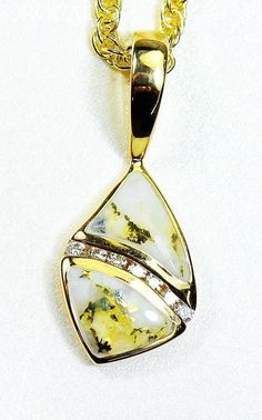 Gold Quartz/Diamonds Pendant "Orocal" PN1071DQ Genuine Hand Crafted Jewelry - One of a Kind - 14k Casting-Approx. weight = 2.5G" If this is not in Stock our Jeweler will make it in 4-6 weeks"Specs and Dimensions: Length/WidthQuartz Stone Size 5x8 mmBail Size 8x3 mmDiamonds - .10ct Total- R stands for Ring, L for Ladies, M Stands for Men, Q stands for the Quartz / E Stands for Earrings and P Stands for PendantWith This Stunning Gold Quartz Pendant you will receive a certificate of authenticity ea Klondike Gold Rush, Natural Gold Nugget, Gold Nugget, Gold Alloys, Vermeil Jewelry, Hand Crafted Jewelry, Gold Flakes, Solid Gold Jewelry, Crafted Jewelry