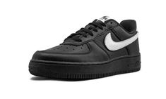 The Nike Air Force 1 Low is a retro style released by the Swoosh brand on September 28, 2019.  Bringing back an old school look that dates back to the 1990s, the lifestyle silhouette is dressed in a simple black and while color palette.  An upgraded premium leather material covers the upper and a double-layered Swoosh logo — one black, one white — is featured on the lateral side.  A white tongue tag and heel tab also add contrast to the mostly black sneaker. White Tongue, School Look, School Looks, Nike Air Force 1 Low, Swoosh Logo, Stadium Goods, September 28, Air Force 1 Low, Nike Air Force 1