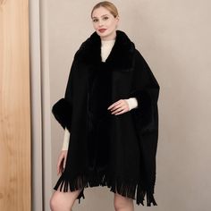 Details Size : 42.9" X 32.7" Material : 100% Acrylic Elegant Oversized Black Cape, Elegant Black Oversized Cape, Black Shawl Cape For Fall, Black Pashmina Shawl For Fall, Black Fringed Outerwear For Winter, Black Fringe Outerwear For Winter, Chic Black Cape Poncho, Black Shawl Winter Outerwear, Winter Fringe Cape Outerwear