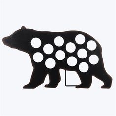 a black bear with white polka dots on it