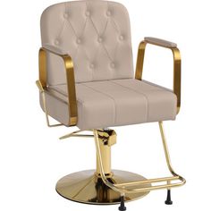 a chair that is sitting on top of a metal base with gold trimmings