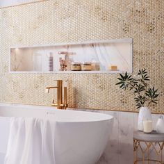 a white bath tub sitting under a mirror next to a table with a vase on it