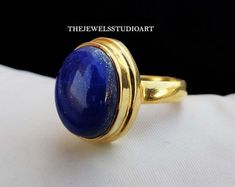 Lapis Lazuli Ring Raw Gemstone September Birthstone | Etsy Denmark Anniversary Yellow Gold Lapis Lazuli Rings, Gold Sapphire Ring In Sterling Silver, Classic Lapis Lazuli Ring As Gift, Classic Lapis Lazuli Ring As A Gift, Cabochon Sapphire Ring Gift, Cabochon Sapphire Ring Fine Jewelry Gift, Gold Lapis Lazuli Gemstone Rings, Lapis Lazuli Gemstone Rings Fine Jewelry, Fine Jewelry Lapis Lazuli Gemstone Rings