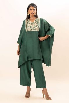 Sap green chanderi short kaftan with floral pattern, contrast gold zardozi and zari thread hand embroidered yoke. Paired with flared pant. - Aza Fashions Festive Green Pant Set With Chikankari Embroidery, Silk Tunic Sets For Wedding, Festive Green Bohemian Pant Set, Traditional Green Pant Set With Resham Embroidery, Green Bollywood Pant Set With Resham Embroidery, Bollywood Silk Tunic Set, Bollywood Style Silk Tunic Set, Green Pant Set With Dupatta For Eid, Traditional Embroidered Green Pant Set