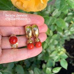 Beautiful oxblood red coral diamond ring and earring set! They are set in 14k yellow gold and have several accent diamonds! Ring Information: Ring Size: 5 -Weight: 7.75 grams -Precious Metal: 14k yellow gold Precious stones: -Coral Center Stone: 7.7mm -Round Diamonds: 0.24 carat Earring Information: -1.2 inch long -Total Weight: 14.37 grams -Precious Metal: 14k yellow gold Precious Stones: -Coral: 8mm -Round Diamonds: .014 carats (total) Classic Red Coral Formal Jewelry, Elegant Yellow Gold Jewelry With Red Coral, Luxury Red Coral Jewelry For Formal Occasions, Luxury Red Coral Jewelry, Elegant Gold Jewelry With Red Coral, Formal Yellow Gold Jewelry With Red Coral, Elegant Red Coral Jewelry With Matching Earrings, Elegant Red Coral Earrings, Luxury 14k Gold Red Earrings