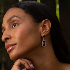 The Story A chic and colorful pair of vintage earrings made from 14 karat yellow gold. Each earring has two lapis lazuli cabochons. The deep blue hue is rich, and each piece has a different pattern of pyrite flecks, making them have a personality of their own.The bottom pieces are independently attached, giving them movement and swing with the wearer. They finish with a post back, and at 1.61 inches in length, they have a chic and eye-catching look. The Specs Style Number: R4029 Vintage, circa 2 Elegant Lapis Lazuli Gemstone Earrings, Elegant Gold Lapis Lazuli Earrings, Luxury Blue Gold-plated Earrings, Blue Lapis Lazuli Earrings For Formal Occasions, Elegant Lapis Lazuli Jewelry With Matching Earrings, Elegant Lapis Lazuli Earrings, Formal Blue Lapis Lazuli Earrings, Gold Teardrop Lapis Lazuli Earrings, Gold Dangle Earrings