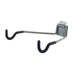 a metal hook on the side of a white wall with a black hose attached to it