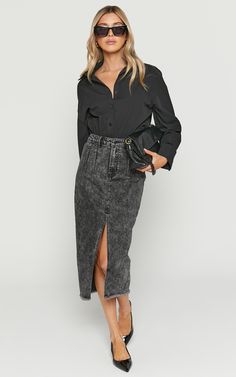 The new season must-have that it-girls are wearing. Make our Janeve Midi Skirt a staple in your wardrobe! It features a high rise waist, dart stitches on the front and back, centre front split, frayed hem and an acid wash finish. It's an incredibly timeless and stylish piece that can be dressed up or down and worn across seasons. Style it for a lunch date with the Gia Tee in White and chunky sandals or for drinks with the girls with the Universal Music - Rolling Stones Tee in Washed Black a Chic Pleated Denim Skirt, Chic Dark Wash Denim Skirt With Pockets, Chic Non-stretch Denim Skirt, High Waist Relaxed Fit Denim Skirt For Fall, Chic Dark Wash Skirt For Fall, Chic Non-stretch Cotton Denim Skirt, Trendy Denim Skirt For Fall, Edgy Fitted Dark Wash Skirt, Edgy Denim Skirt For Night Out