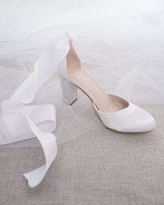 Satin block heel with satin ribbon ankle tie. Beautiful and yet looks fun and dramatic.DETAILS:HEEL HEIGHT: 3 inchesCOLORS AVAILABLE: Champagne, White, Ivory, Navy, Burgundy, and Light BlueUPPER: Synthetic upper and liningMATERIALS: Mandmade outsoleSTYLE NAME: SARAH Satin Wedding Shoes With 4-inch Heel, Satin Closed-toe Bridesmaid Wedding Shoes, Satin Heels With Round Toe For Bridesmaids, Satin Round Toe Heels For Bridesmaids, Bridesmaid Wedding Shoes With Satin Bow, White Satin Bow Wedding Shoes For Bridesmaids, Bridesmaid Satin Wedding Shoes, Closed Toe Satin Heels For Wedding, Satin Closed Toe Heels For Wedding