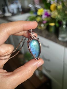 I handmade this colorful labradorite necklace using sturdy, solid copper wire that I've antiqued and carefully hand polished using a 3-step high polishing process. It comes on a matching, custom made chain of exceptional quality (see chain length in details below) and I also include a complimentary polishing pad so you can care for and maintain your new jewelry.  Everything from my shop always comes in a cute little black and white gift box, but if you're gifting your purchase to someone, you ca Easy Wire Wrapping Stones, Wrapping Stones, Wire Jewelry Designs, Labradorite Necklace, Wire Wrapping Stones, Labradorite Necklaces, Homemade Jewelry, Beaded Wraps, Purple Labradorite