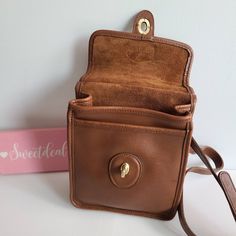 "Original Classic Coach Murphy Bag British tan leather with brass hardware Roomy interior with inner zip pocket Covered by a flap and secured with a turnlock Back slip pocket Adjustable strap Measures: 7\"L, 9.5\"H, 4\"W Made in United States #H5C-9930 Flaws: back leather scratch and a deep small scratch near top dowel Cleaned, conditioned and ready to wear! Questions? Just ask More vtg coach styles/colors also available" Coach Hudson Small Pack, Bonnie Cashin, Custom Hand Painted, Vintage Coach, Tiffany Blue, Custom Bags, Sewing Bag, Coach Purses, Brass Hardware