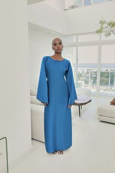 Falak — Très Belle Prints | Luxury Modest Fashion Elegant Belted Maxi Dress For Brunch, Elegant Solid Color Bell Sleeve Dresses, Elegant Bell Sleeve Solid Dresses, Elegant Blue Maxi Dress With Draped Sleeves, Blue Flowy Dress With Bell Sleeves, Chic Blue Bell Sleeve Dress, Belle Beauty, Blue Bell, Modest Wear