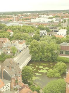 an aerial view of a city with lots of trees