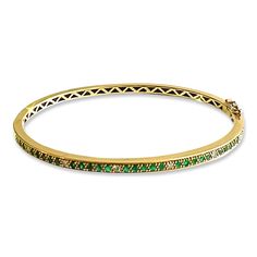 This emerald & diamond bangle is a stunner.  It adds flair, color, and an elegant bohemian vibe to any stack.  The bracelet measures 3.3mm wide and is available in 14k yellow, rose, or white gold.  It has a hidden closure complete with a safety lock.  Stack it alone or mix with other bracelets and dot bangles. Luxury Green Gemstone Bangle, Luxury Stackable May Birthstone Jewelry, Luxury Stackable Emerald Jewelry, Luxury Green Bangle Bracelets, Luxury Emerald Bangle Jewelry, Yellow Gold Emerald Bangle, Elegant Green Stackable Bracelets, Yellow Gold Emerald Bangle Bracelets, Yellow Gold Emerald Bangle Bracelet