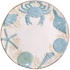 a blue and white plate with sea animals on it