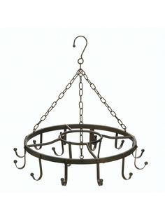 a circular metal pot rack with hooks hanging from it's center and bottom bars