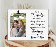 a photo frame with the words, it's the friends we meet along the way that help us appreciate the journey