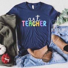 Art Teacher Tshirt - With over 39,000 sales and more than 5,000 reviews, we have experience in providing a t-shirt you will love. Our shirt options feel soft and comfortable made from cotton (heather colors also contain polyester).  - Soft t-shirts with quality shirt print - Fast customer service - We are here to help answer any questions! - Many different color and size options SIZING INFO Our unisex tees have a regular t-shirt fit. Width and length measurements for all sizes can be seen in the Relaxed Fit T-shirt With Custom Artwork For Artistic Expression, Artsy Cotton T-shirt With Custom Print, Graphic Design Cotton T-shirt, Artistic T-shirt With Custom Artwork, Relaxed Fit, Artistic Relaxed Fit T-shirt With Custom Artwork, Artistic Multicolor Cotton Shirt, Artistic Short Sleeve Tops With Custom Artwork, Short Sleeve Cotton Tops For Artistic Expression, Artistic Expression Cotton Short Sleeve Tops