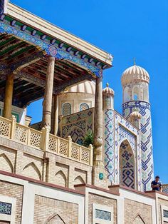 an ornate building with blue and white tiles