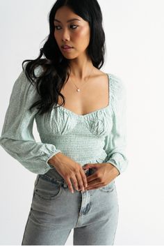 Lazy Afternoon Mint Ditsy Floral Smocked Crop Top https://www.tobi.com/product/77116-tobi-lazy-afternoon-ditsy-floral-smocked-crop-top?color_id=109574&utm_source=pinterest&utm_medium=social&utm_campaign={campaignid}_{adgroupid}_{product_id} Fitted Flirty Smocked Top For Day Out, Fitted Smocked Top In Flirty Style For Spring, Fitted Smocked Top For Spring, Flirty Style, Spring Fitted Flirty Smocked Top, Fitted Flirty Smocked Top For Spring, Fitted Floral Print V-neck Smocked Top, Spring Smocked Top With Elastic Square Neckline, Trendy Spring Tops With Sweetheart Neckline, Fitted Smocked Top With Long Sleeves And Elastic Neckline