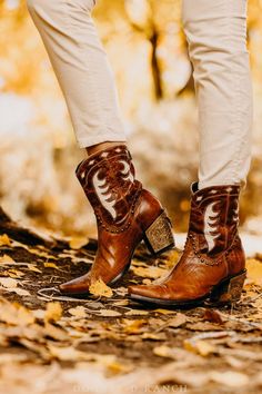 Here is your ultimate multi-tasker for work or play – this mid-calf boot adds a western edge to your wardrobe, ups your boho dressing game, and adds a bit of bling to your step with it's engraved silver heel cap. The Cattleman Boot will be one of the most hardworking pieces in your wardrobe. Western Style Winter Moto Boots For Rodeo, Leather Mid-calf Boots With Stacked Heel For Western Events, Leather Boots For Fall Festival, Fall Festival Leather Boots, Western Style Moto Boots For Winter Rodeo, Western Style Moto Boots For Rodeo In Winter, Bohemian Moto Boots For Festival In Fall, Western Mid-calf Boots With Stacked Heel And Snip Toe, Bohemian Boots For Rodeo In Fall