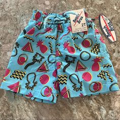 New With Tags! Beach Bros Toddler Swim Shorts/Trunks. Size 2t. 80/ Retro Print With Pineapples And Palm Trees. Very Saved By The Bell Vibes. Elastic Waist. Velcro Back Pocket With Shaka Logo. Ties At Waist Are Sewn Down So Can’t Be Removed. Mesh Liner On The Inside. From A Smoke-Free Home. Thanks For Looking! Check Out My Other Listings To Bundle! Playful Blue Swim Trunks For Summer, Blue Beachwear Bottoms For Summer Activities, Blue Bottoms For Beachwear In Summer, Playful Blue Swim Trunks For Summer Activities, Fun Blue Swim Trunks For Beach Season, Playful Blue Swim Trunks For Poolside, Playful Swim Trunks For Summer, Fun Blue Bottoms For Poolside, Fun Blue Poolside Bottoms