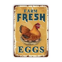 a metal sign with an image of a chicken on the front and side, says farm fresh eggs