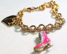 End of Webstore COSMO_HEADER COOL HOT PINK 1" AND GOLD TONE FIGURE SKATE CZ CHARM AND DOUBLE HEART CHARM WITH BRACELET APPROX 8 INCH BRACELET LOBSTER CLASP CHUNKY BRACELET APPROX 9.5MM LINKS YOU OR YOUR SKATER WILL LOVE THIS! CHECK OUT OUR POSITIVE FEEDBACK. WE ARE HERE TO PLEASE YOU! INTERNATIONAL PURCHASERS PLEASE ALLOW 12 - 17 BUSINESS DAYS FOR INTERNATIONAL MAIL. WE SHIP WITHIN 24 HOURS, BUT HAVE NO CONTROL OVER THE DELIVERY TIME FRAME OF THE POSTAL SERVICE. THANK YOU IN ADVANCE. [END] Echo Pink Gold-plated Jewelry With Adjustable Chain, Pink Gold Plated Jewelry With Adjustable Chain, Pink Chain Bracelet Jewelry, Pink Adjustable Chain Bracelet, Trendy Pink Gold-plated Jewelry, Trendy Pink Gold Plated Jewelry, Gold Chain Charm Bracelet For Valentine's Day, Valentine's Day Gold Chain Charm Bracelet, Pink Metal Charm Bracelet As A Gift