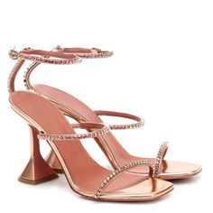 Not your average strappy sandal heels. RIVER is a certified showstopper! With a cocktail glass heel and crystal lined straps, these rose gold heels are truly one of a kind. Product Details: Heel height: 3.8" Color: Rose Gold Fits true to size Material: Synthetic Pyramid Heels, Rose Heels, Heel Collection, Glass Heels, Rose Gold Heels, Heels Aesthetic, Strappy High Heels Sandals, Square Toe Heels, Sandal Heels