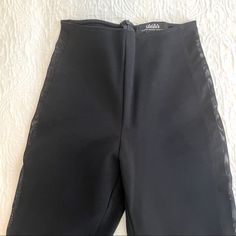 Nwot Black Skinny Pant With Mesh Panels. Legging Like Fit But A Thicker Fabric. Dress Up Or Dress Down For Casual Look. Size Xs Back Zipper No Waist Band Never Worn. Nwot Fabric Stretches. Ankle Length. Stretch Bottoms With Back Zipper For Night Out, Black Party Bottoms With Back Zipper, High Waist Bottoms With Back Zipper For Night Out, High-waist Bottoms With Back Zipper For Night Out, Chic Black Bottoms With Back Zipper, Chic Party Bottoms With Back Zipper, Party Bottoms With Back Zipper And Stretch, Fitted High Waist Bottoms With Back Zipper, Fitted Pants For Date Night