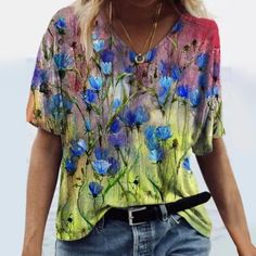 Watercolor Floral Short Sleeve Printed V-Neck T-Shirt Blouse New Without Tags. Color: Blue Multicolored Size: Large Relaxed Fit Multicolor V-neck Top, Casual Floral Print V-neck Top For Summer, Multicolor V-neck Top For Spring, Multicolor Floral Print V-neck T-shirt, Spring Printed V-neck Tops, Bohemian V-neck Tops With Graphic Print, Spring V-neck Printed Tops, Green V-neck T-shirt For Summer, Blue V-neck T-shirt For Summer