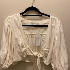 Women’s Urban Outfitters White Top Condition: Never Worn Size: M More Photos And Details Can Be Provided If Interested Send An Offer!! Urban Outfitters Spring Vacation Blouse, Chic Cropped Blouse From Urban Outfitters, Urban Outfitters Blouse For Spring Vacation, Urban Outfitters Blouse For Vacation In Spring, Urban Outfitters Spring Day Out Blouse, Chic Urban Outfitters Crop Top For Spring, Chic Urban Outfitters Crop Top, Chic White Blouse From Urban Outfitters, Chic Urban Outfitters Crop Top For Day Out