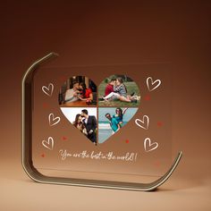 a glass photo frame with hearts and the words you are the best in the world