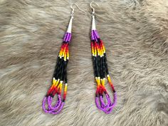 Authentic Beautiful Native American Indian Jewelry Navajo Hand Beaded Long Dangle Earrings. Great for a gift❤️ Handcrafted by Navajo Artist R. Sellers These beautiful earrings are 5.5" in length and 1" in width. Southwestern Style Earrings With Round Beads For Festivals, Southwestern Style Round Bead Earrings For Festivals, Southwestern Style Earrings With Colorful Beads, Southwestern Style Earrings With Dangling Round Beads, Southwestern Beaded Drop Earrings For Pierced Ears, Southwestern Style Beaded Drop Earrings, Southwestern Adjustable Dangling Bead Earrings, Southwestern Style Beaded Earrings For Festival, Southwestern Teardrop Beaded Earrings